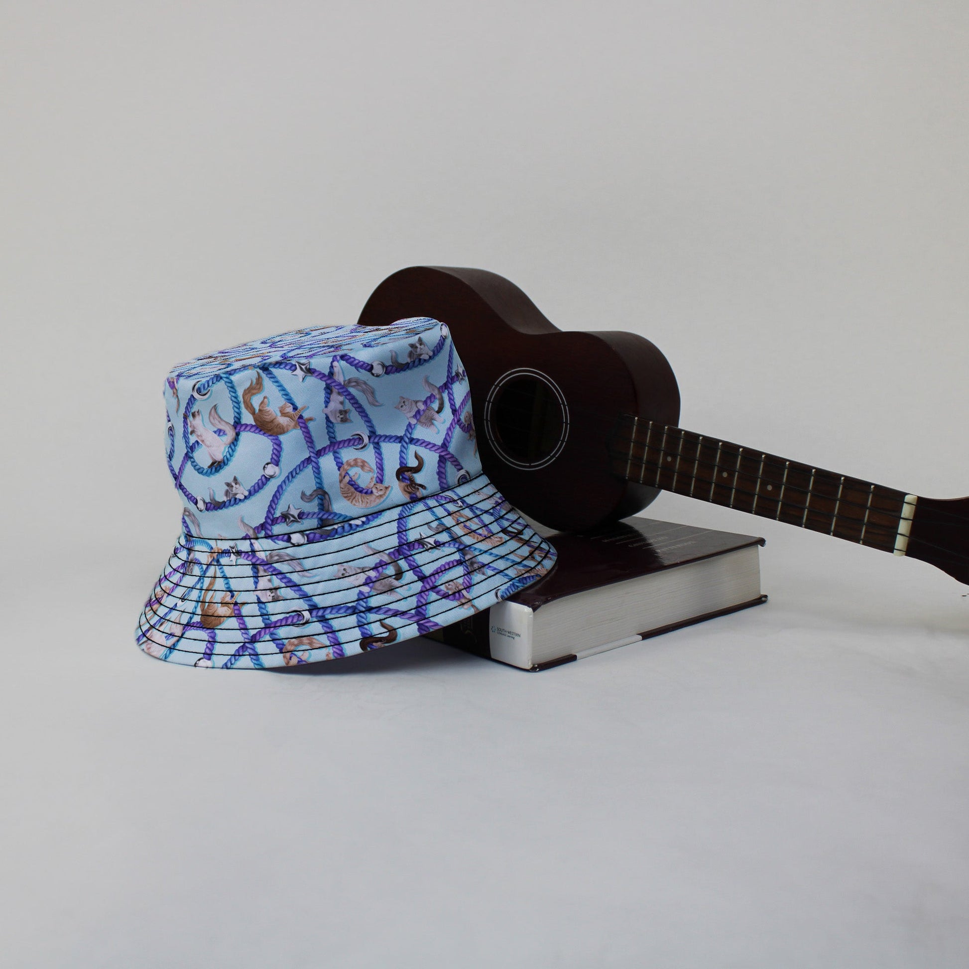 Cosmic Yarn Cats Teal Bucket Hat Lifestyle