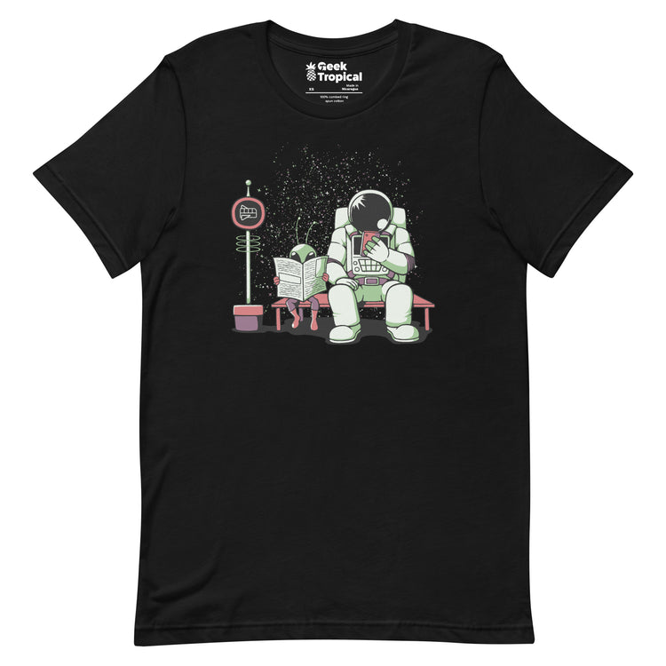 Astronaut In a Bus Stop Funny Alien Reading Newspaper T-Shirt Geek Nerd Advertise to Meta Design by Tobe Fonseca Fantasy Prints