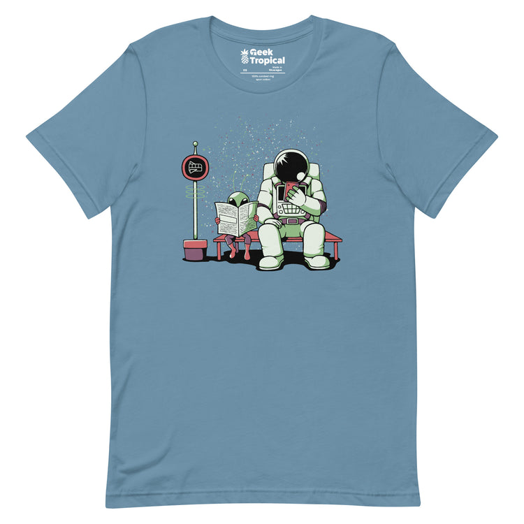 Astronaut In a Bus Stop Funny Alien Reading Newspaper T-Shirt Geek Nerd Advertise to Meta Design by Tobe Fonseca Fantasy Prints